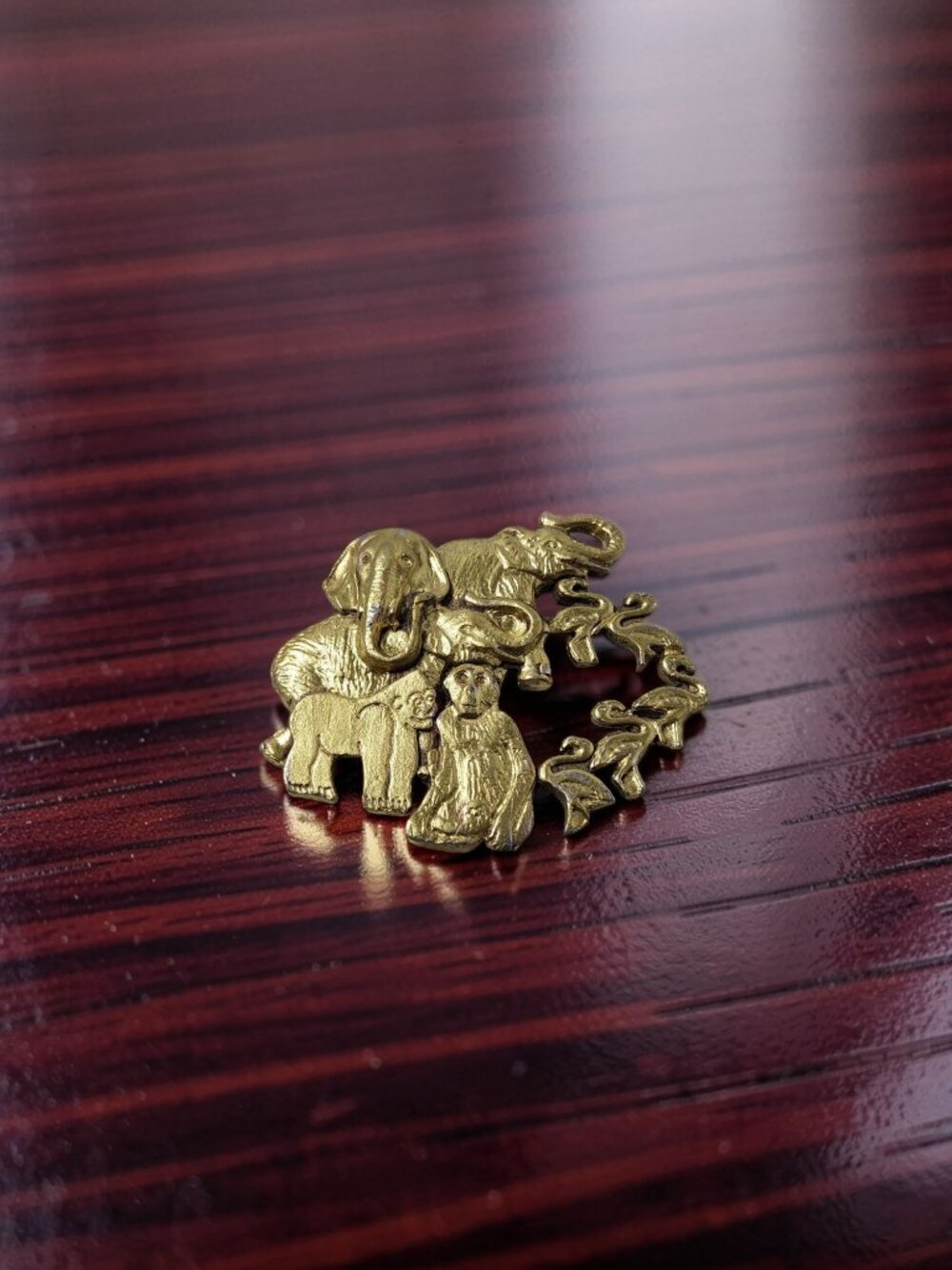 vintage wild animals, elephant, gorillas, swans ? gold tone brooch